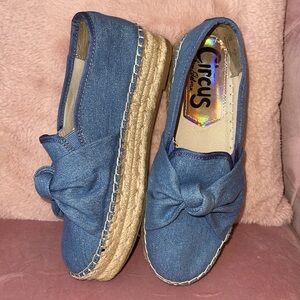 Sam Alderman’s ‘CIRCUS’ Blue Jean Bow Platformsv